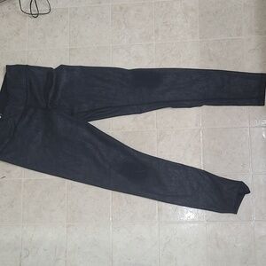 90 degree.   F/12.    Black leggings